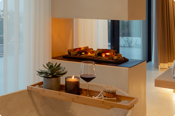 Dimplex vapour fireplace with Log set in a bathroom setting